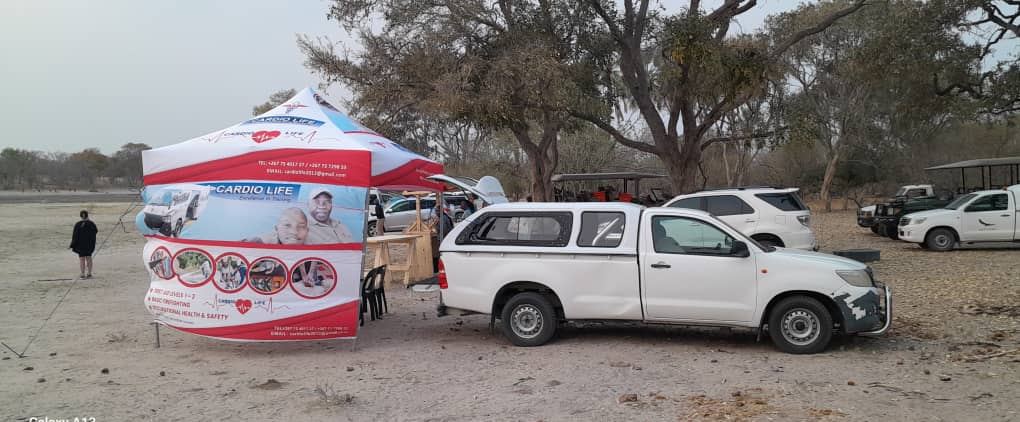 Cardio Life branded field station and vehicle at an on-site training day in Botswana